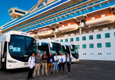 Cruise passengers enjoying a private shore excursion Machu Picchu from El Callao Port with panoramic views of the Inca citadel.